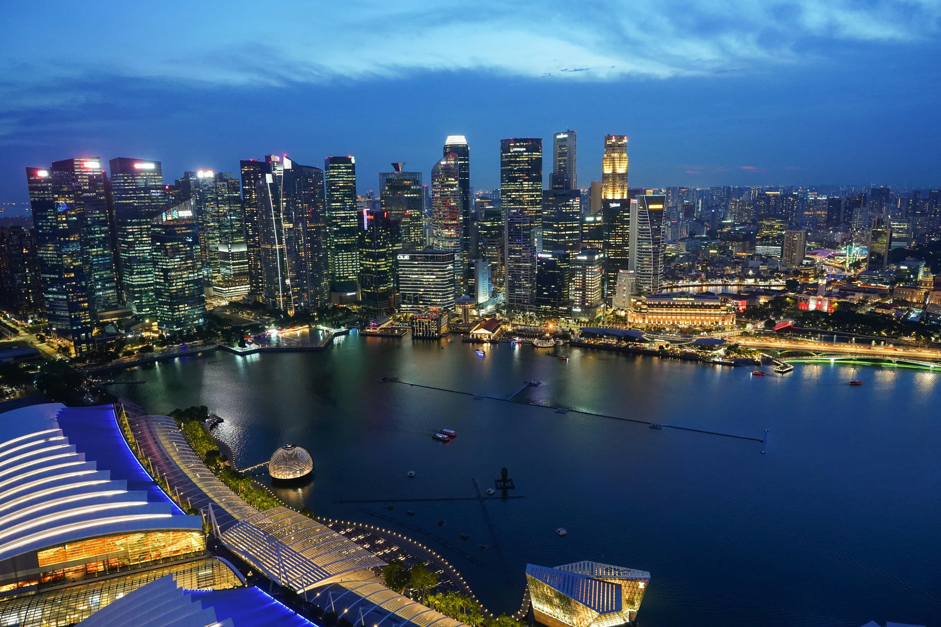 Aerial view of a metropolitan financial district skyline at dusk